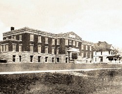 A old, grainy black and white photo of Sabetha Community Hospital