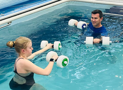 physical therapist with patient.